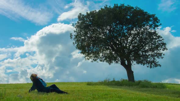 Beautiful Brunette Female Under Tree, Upset Woman Sitting Alone on Green Grass