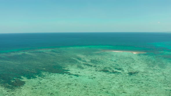 Sandy Beach on a Coral Reef. Balabac, Palawan, Philippines