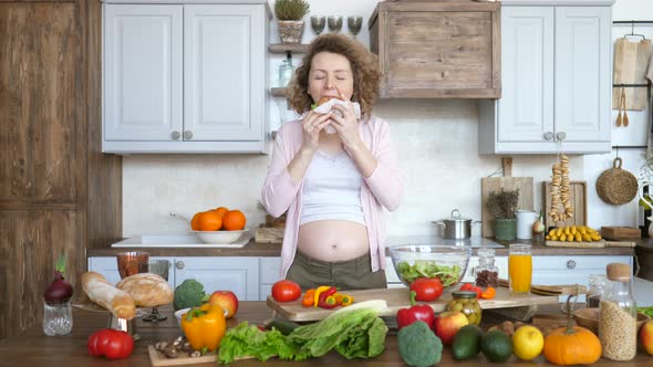 Beautiful Pregnant Woman Eating Burger