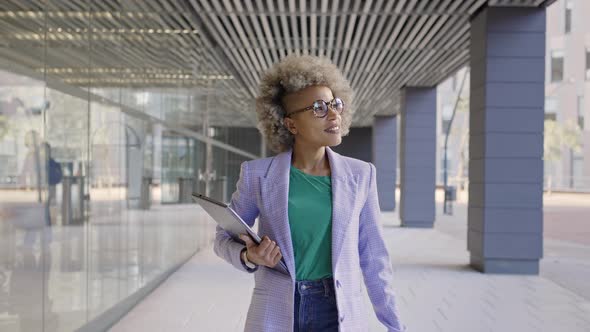 Confident Black Business Woman Walking in Office District Smiling Empowered African American Female