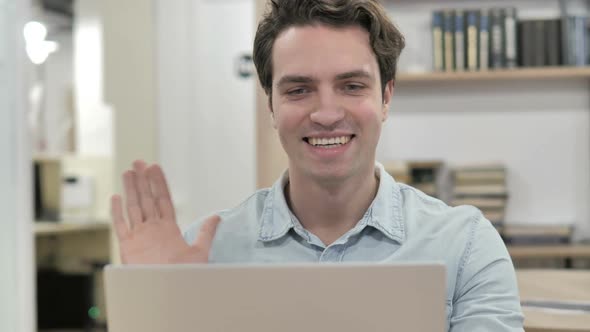 Online Video Chat on Laptop at Work