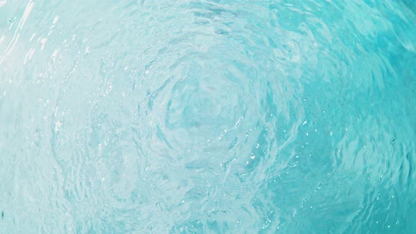 Super Slow Motion Shot of Clear Water Surface Waving Over White Sand Beach at 1000Fps