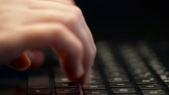 Close Up of Female Hands Typing on Laptop Keyboard 