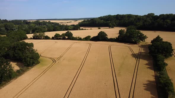 Aerial view farmland and fields in English countryside in summer sun