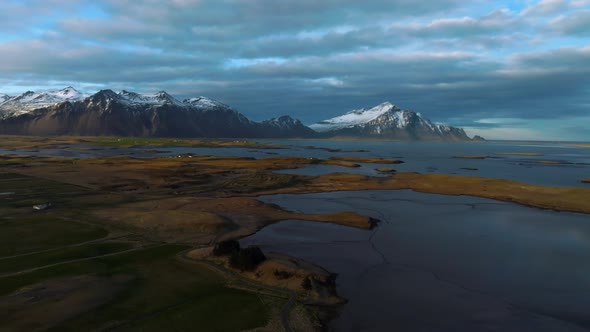 Fantastic Aerial Views of the Landscape in Iceland with Vestrahorn Mountains on the Horizon