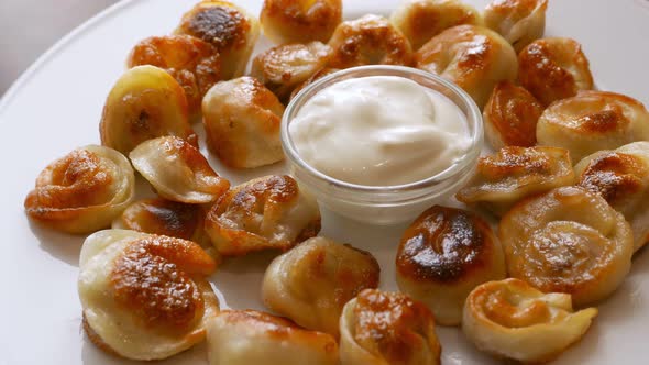 Roasted Dumplings with a Cream Sauce