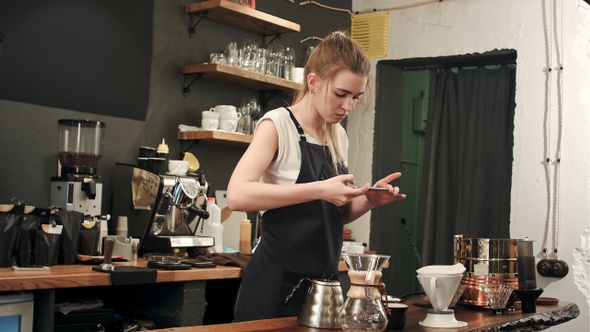 Taking a photo of coffee in the coffee shop