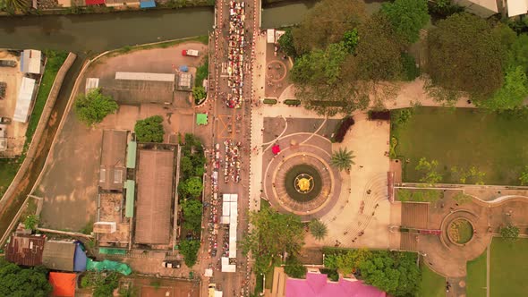 Aerial view Drone flying over phuket city Thailand.Drone over a street night market in Sunday day