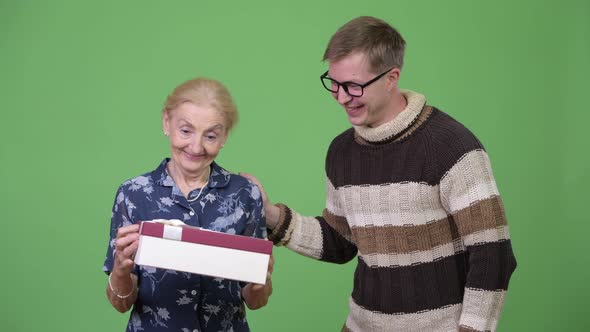 Grandmother Getting Gift From Grandson with Nothing Inside