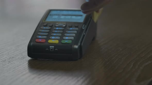 Closeup Shot of Customer Pay Over the Wireless Tradings Card-reader