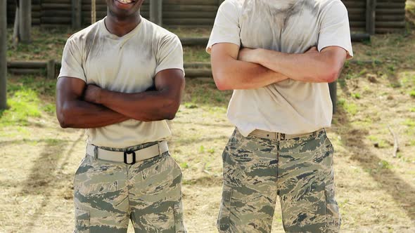 Fit men standing at boot camp