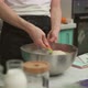 Crop Lady Mixing Batter Ingredients in Bowl in Kitchen - VideoHive Item for Sale