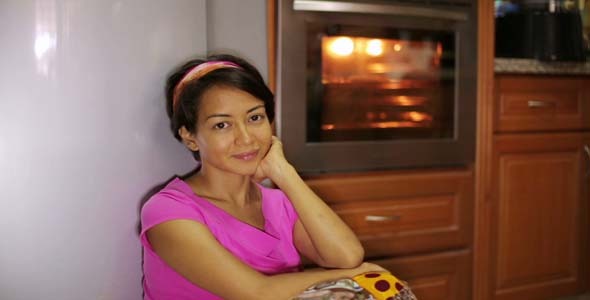Woman Waiting Food In Kitchen 2