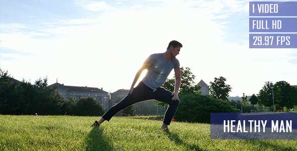 Healthy Sportsman Doing Stretches In The Park