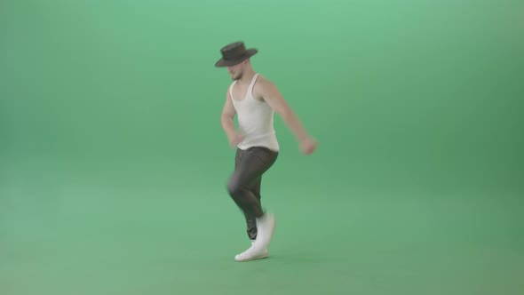Sport Man In Black Hat Dancing And Marching Fast Isolated Over Green Screen   4 K Video Footage