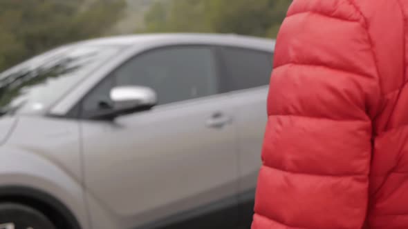 Woman Getting Into the Car