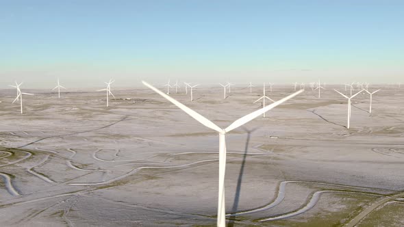 Aerial shots of wind turbines on a cold winter afternoon in Calhan, Colorado