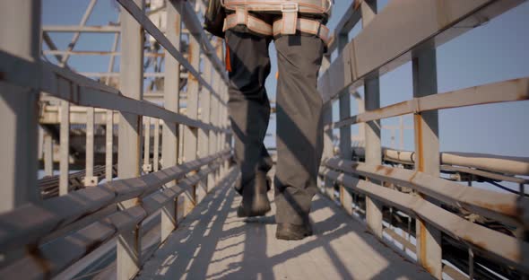 Engineer Walking on a Cellular Tower