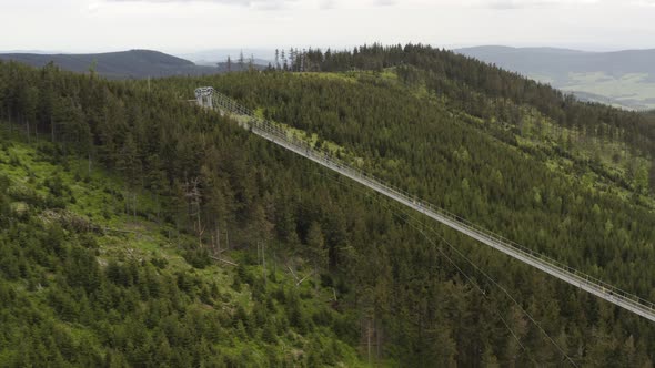 World's longest suspension footbridge in czech mountains, drone shot.