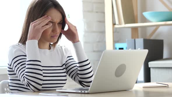 Frustrated Beautiful Young Woman Working on Laptop