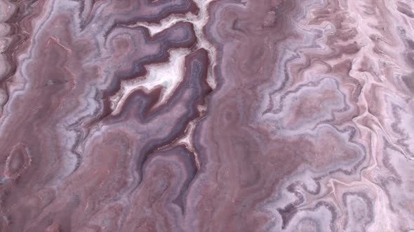 Aerial view of colorful desert textured terrain in Mars like landscape
