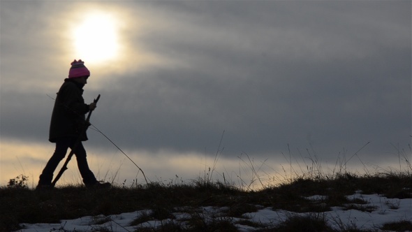 Silhouette of Child in Sunset