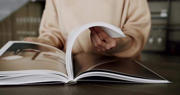 Slow Motion Young Woman Hands Flipping Through Bullet Journal White Paper Pages