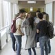 Group of students taking selfie with smartphone in corridor - VideoHive Item for Sale