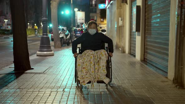 Wheelchair Ride in the Evening City