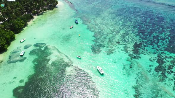 Aerial drone sky of beautiful coastline beach break by blue water and white sandy background of a da