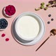 Smoothie bowls with granola, blueberries and raspberries on a pink background. Healthy breakfast ste - VideoHive Item for Sale