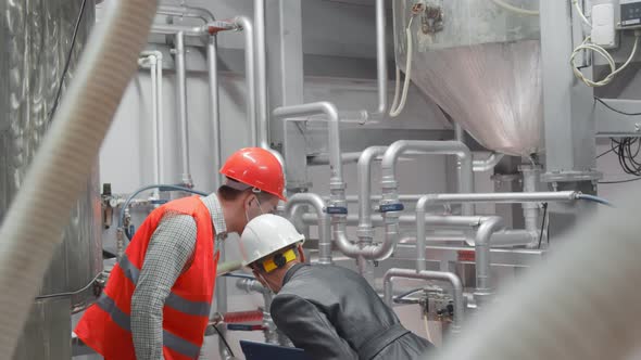 Engineer and Supervisor in Safety Mask Checking Manufacturing Production Equipment