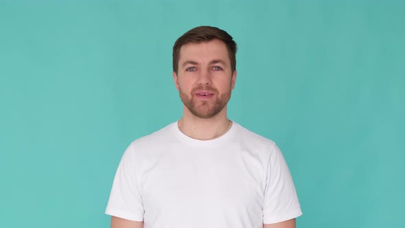 Close Up of a Surprised Man Shouting Wow and Looking at the Camera in Surprise