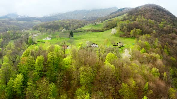 Aerial Video of the Small Town of Pasturo in Lombardy North Italy Showing Mountain Panorama Forest