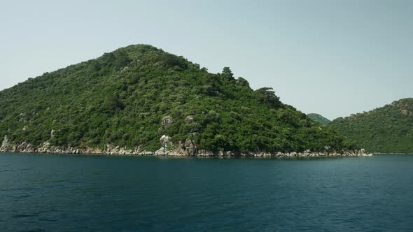 Green Coastal Hills On The Seashore