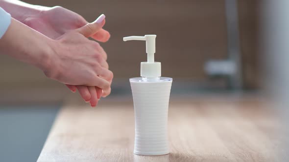 Hygiene, Female Uses a Means for Washing Hands, Causing Sanitizer on the Hands, Prevention of Virus