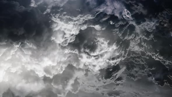 POV  thunderstorm in the cumulus clouds in the dark sky