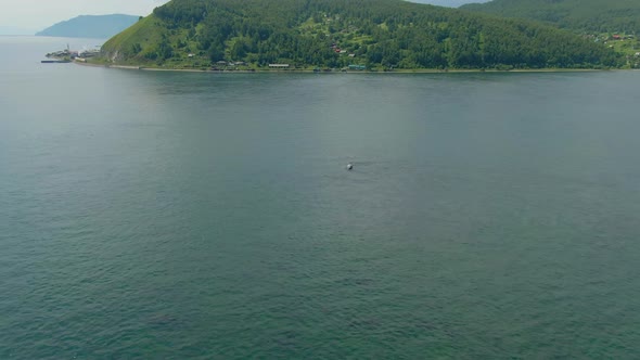 Flight Over Water to the River Bank