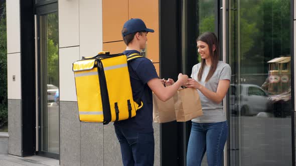 Smiling Food Delivery Man Courier with Thermal Backpack Deliver Order Woman