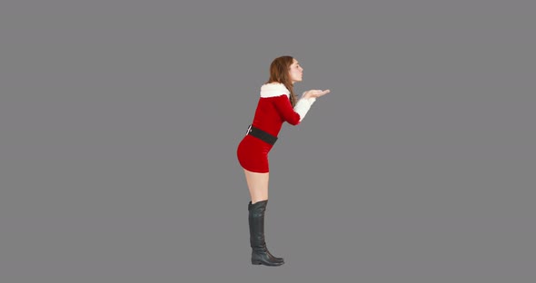 Christmas girl walking and blowing kiss 4k