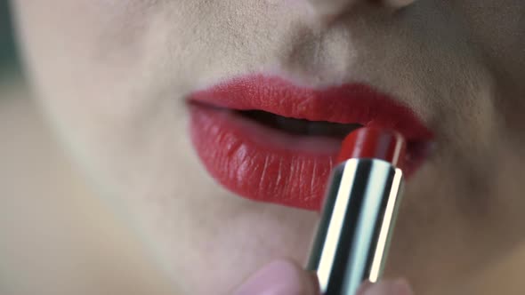 Obese Female Applying Red Lipstick and Preparing for Date With Boyfriend