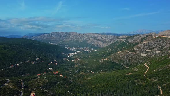 Aerial shot flying over the Dinaric Alps in Croatia on a beautiful summer day