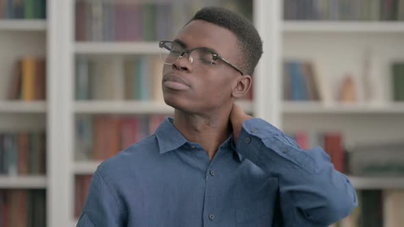 Young African Man Having Neck Pain