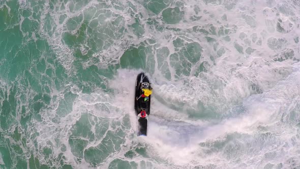 Aerial view of lifeguard surf rescue jet ski personal watercraft in Hawaii