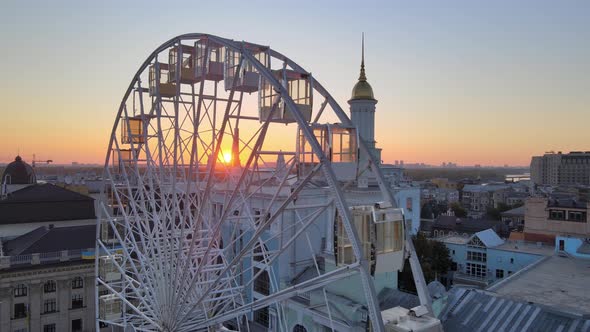 Ferris Wheel in the Morning at Sunrise in Kyiv, Ukraine. Aerial View