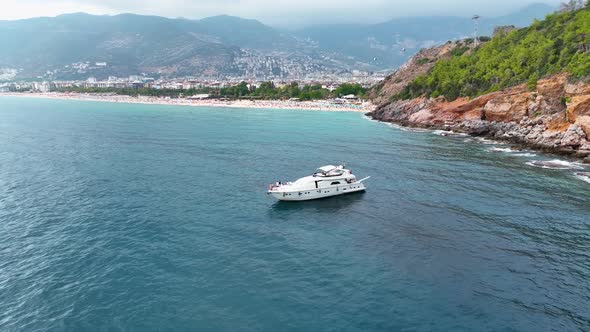 People dancing on a yacht aerial view 4 K