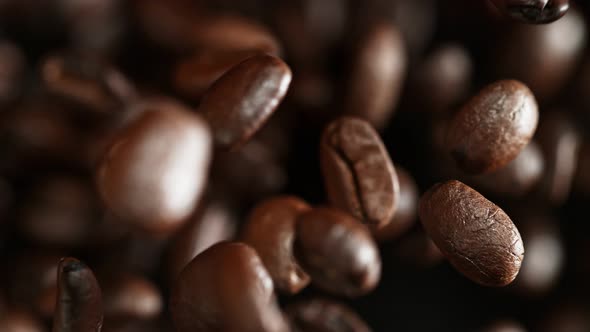 Super Slow Motion Shot of Exploding Premium Coffee Beans Towards the Camera at 1000Fps.