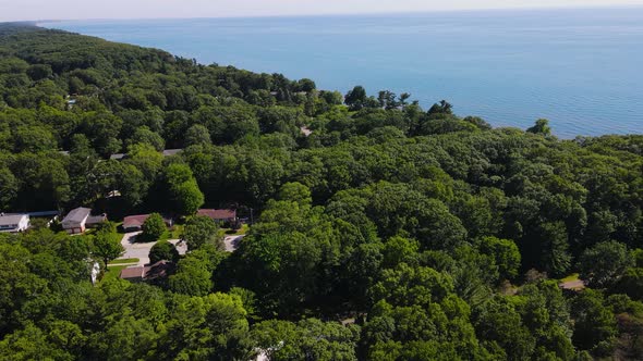 Angular momentum push over the treeline near the coast of Lake Michigan.