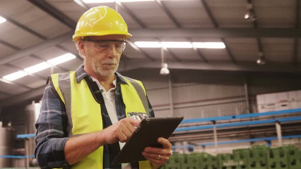 Worker using digital tablet