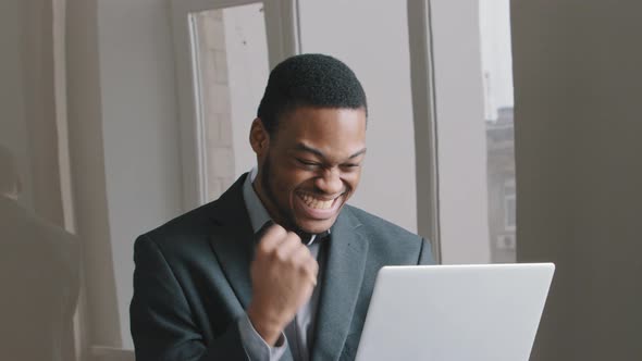 Attractive Young Black Man Use Laptop Read Received Email Feels Happy